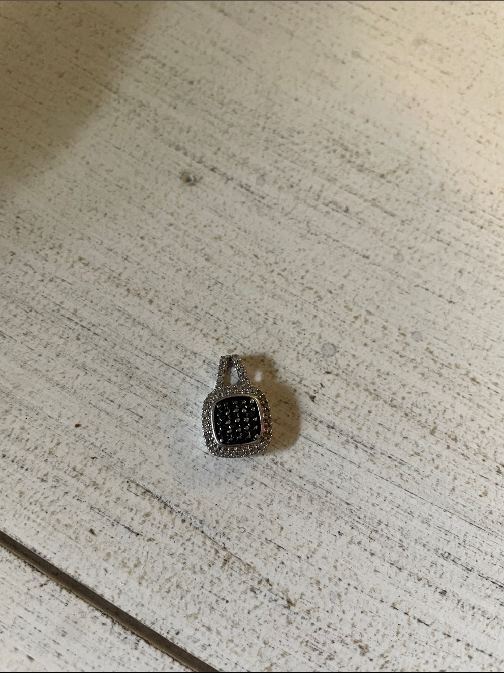 White and black diamond silver pendant